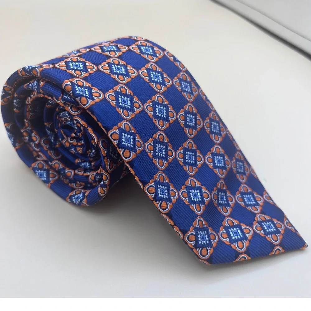 Jos A Bank Signature Mens Silk Tie Blue Orange Geometric Medallion Silk Necktie